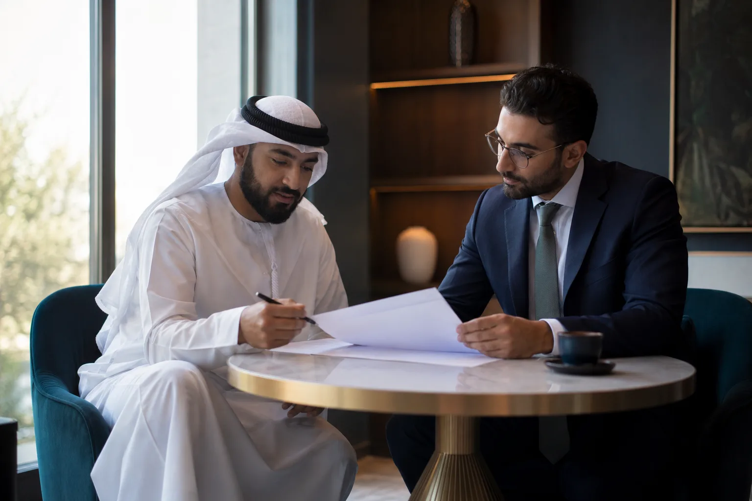 Two professionals in considered advisory discussion